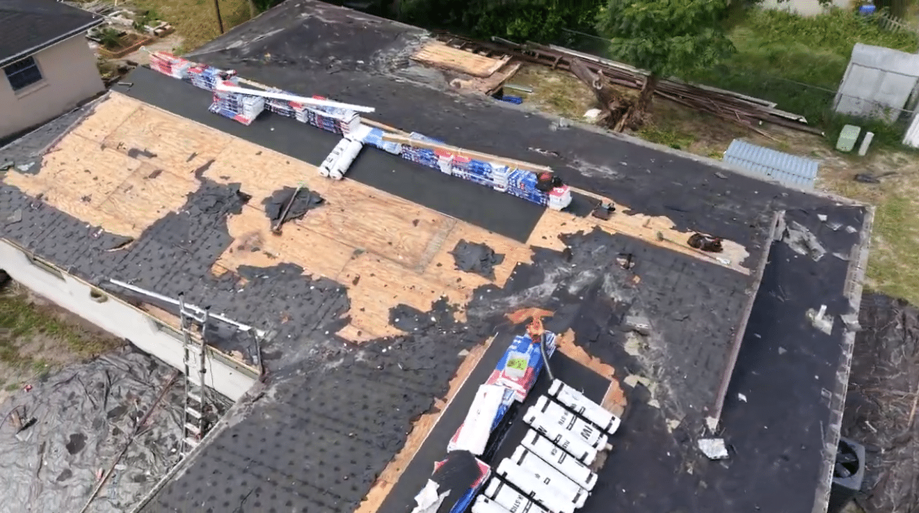 RNC roof repair team at work, representing why shingle roof replacement matter