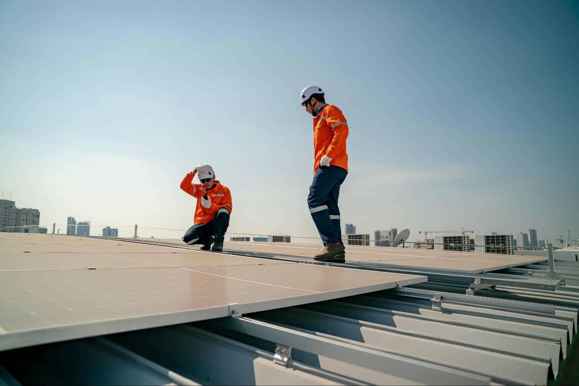 professionals working on a rooftop