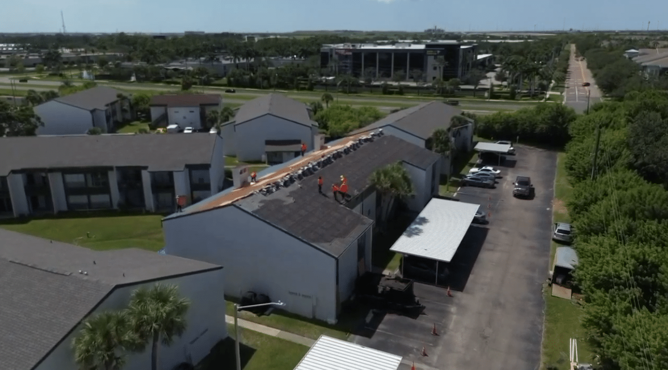 RNC roofing professionals at work
